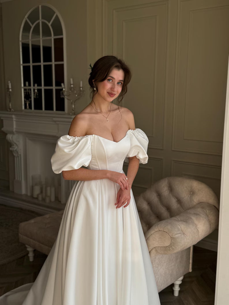 Elegant Ivory Off-the-Shoulder Puff Sleeve Satin Sweetheart A-Line Wedding Dress TP5959