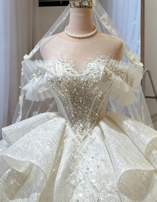 Elegant Off-the-Shoulder Puff Sleeve Sparkling Sequin Lace Ruffled Layered A-Line Wedding Dress TP5956
