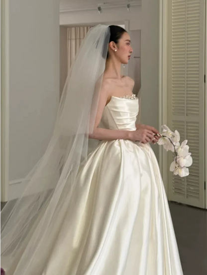 Romantic Ivory Strapless Satin Pearl Trim Neckline Ruched Bodice A‑Line Wedding Dress TP6122